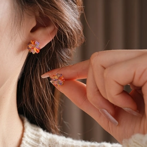 Colorful crystal cluster flower stud earrings shown on model for stylish daily wear