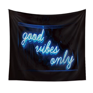 Bohemian black wall tapestry featuring blue neon style Good Vibes Only text for room decor