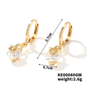Detailed view of gold drop earrings with white zircon, dimensions 2.7cm by 0.7cm