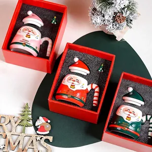 Christmas ceramic mug gift set with Santa claus pattern, lid and spoon in festive gift box