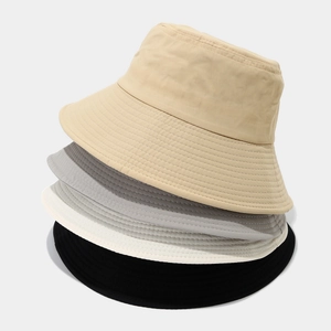Minimalist quick-dry bucket hats in four colors including khaki grey white and black