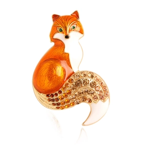 Elegant fox brooch with orange enamel, green crystal eyes and pavé rhinestones