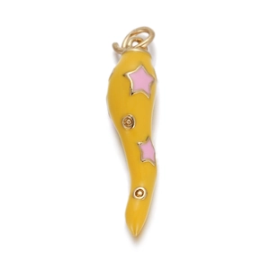 Macro shot of y2k gold chili pendant with yellow enamel coating and pink star detail