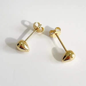 Minimalist 925 sterling silver golden teardrop stud earrings with polished finish on white