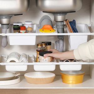Expandable under sink organizer with two tiers and six sliding baskets in white finish