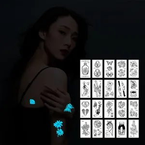 Leuchtende temporäre Tattoos im Dunkeln mit Schmetterling und floralen Neon-Mustern