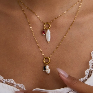 Gold stainless steel necklace featuring baroque pearl and colorful gemstone pendants