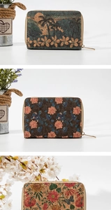 Three cork zipper wallets with tropical, rose, and floral butterfly patterns