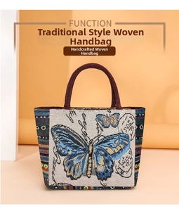 Close-up of ethnic woven handbag featuring blue butterfly pattern and striped details