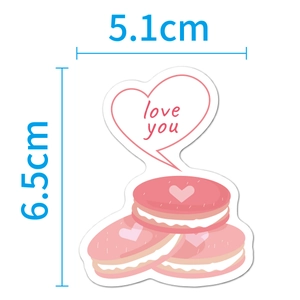 Macro detail of holographic pink heart sticker with love you text measuring 5.1cm x 6.5cm