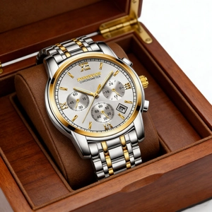 Detailed view of the KINGNUOS men's two-tone stainless steel watch in a wooden box