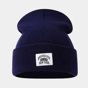 Dark blue Brooklyn knitted beanie with vintage ribbed texture and patch for men and women