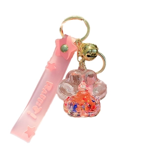 Portachiavi zampa di gatto rosa con glitter liquidi, cinturino coniglio e campanello d'oro