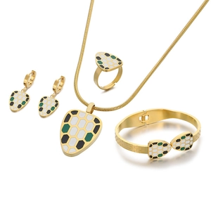 Colorful snake-shaped jewelry set with necklace, earrings, ring, and open cuff bracelet