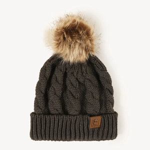 Close-up of brown cable knit beanie with faux fur pompom and letter E leather patch