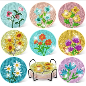 DIY diamond painting coaster set with sunflower designs and black metal holder