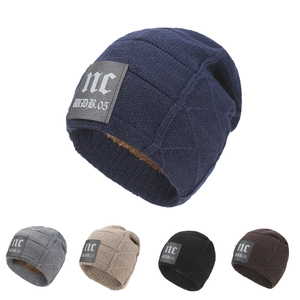 Winter fleece-lined knit beanie for men and women featuring a leather logo patch