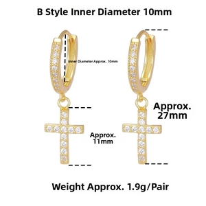 Macro detail of gold cross hoop earrings with white zircon stones and size dimensions