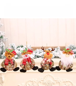 Detail of Christmas fabric plush ornaments showing reindeer and snowman with 15cm height