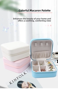 Three macaron colors of PU leather portable jewelry boxes displayed with a coffee cup