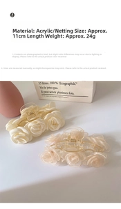 Detail of camellia hair claw clip with fabric petals, measuring 11cm and weighing 24g