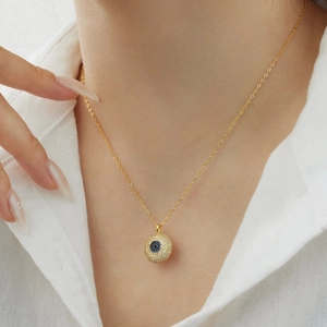 Elegant gold S925 sterling silver evil eye pendant necklace with pavé zircons for women