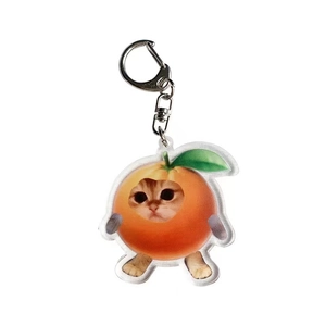 Acrylic cartoon orange cat keychain with metal lobster clasp on white background