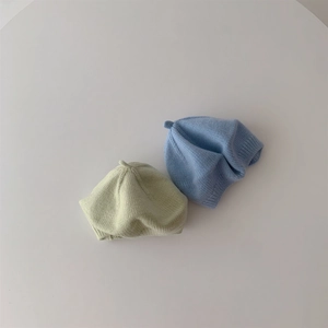 Adorable knit baby berets in soft light green and sky blue for autumn and winter outfits