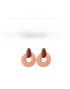 Detail showing oversized geometric wooden earrings with dimensions 7.5cm x 6cm and weight 19.4g