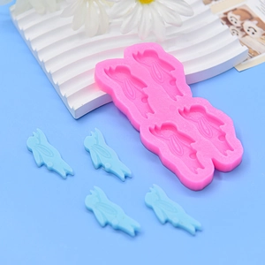 Pink silicone bunny mold with four cavities for chocolate fondant and DIY crafts