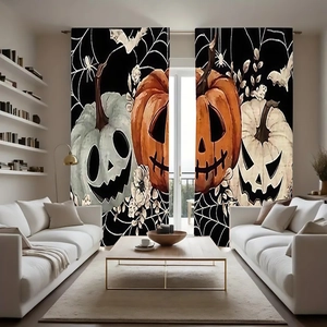 Detail of Halloween curtains featuring orange pumpkins, spider webs, and bats on black fabric