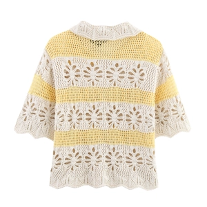 Crochet knit short sleeve top with floral hollow pattern and wavy hem details
