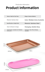 Macro view of stainless steel jewelry trays in rectangular rose gold and oval pink finishes