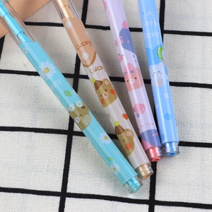 Close-up of four colorful cartoon bear pencils with lucky text on grid background