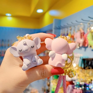 Cute cartoon elephant keychains with golden crowns and woven straps for bags