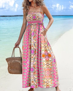 Bohemian floral maxi dress with backless halter design for summer beach vacation look