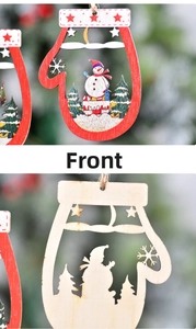 Macro detail of glove-shaped wooden Christmas pendant with snowman painting and cut-out edges