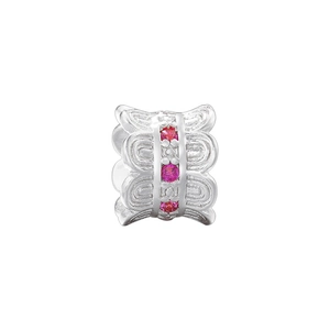 Detailed macro view of 18K gold plated spacer bead with pink cubic zirconia inlay