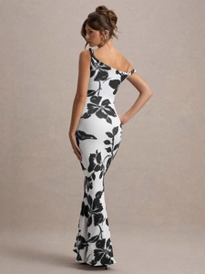 Slim fit fishtail dress for women featuring white fabric with black floral patterns