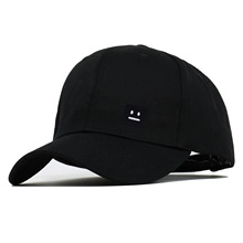Close-up of the adjustable back buckle on a vintage black embroidered baseball cap