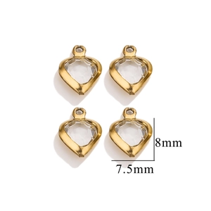 Detail view of 8mm x 7.5mm gold stainless steel heart charms with clear crystals