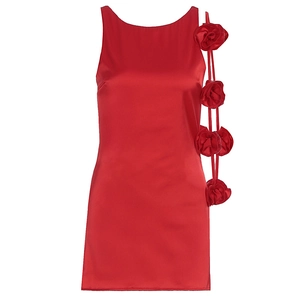 Detail of red satin dress featuring 3D floral decorations on a sleeveless silhouette