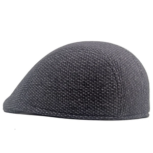 Detailed close-up showing the dark gray wool blend texture of this winter flat cap