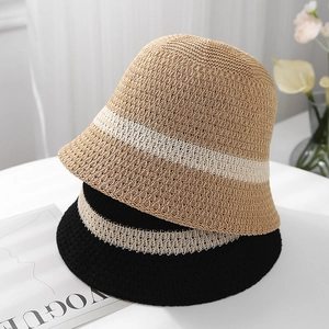 Close-up of breathable hollow-out knit bucket hats in khaki and black with stripe detail