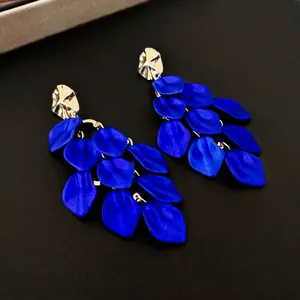 Luxurious layered blue leaf fringe earrings with irregular golden metallic stud details