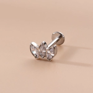 16G stainless steel labret stud with three marquise-cut zircons in a crown setting