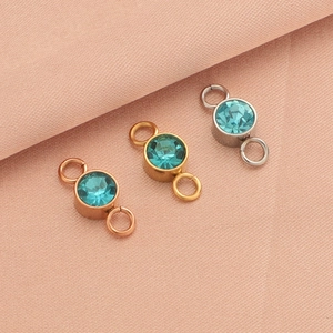 Three-color stainless steel birthstone connectors in gold, silver, and rose gold finishes