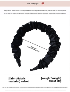 Detail view of a black velvet pleated headband showing a 13cm diameter and soft texture