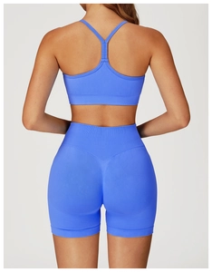 Vue arrière du short de yoga bleu sans couture taille haute et soutien-gorge de sport