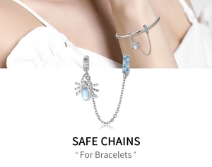Detailed view of silver spider safety chain with blue zircon stones for charm bracelets